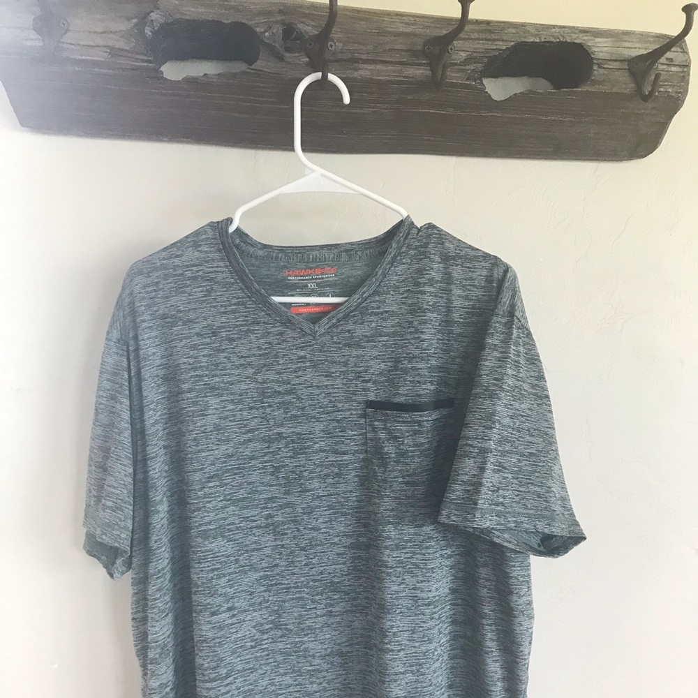 T-shirt with pocket.